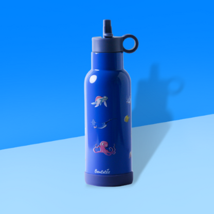 Bentotss Ocean Splash Blue Stainless Steel Bento Sipper bottle with a marine life pattern, displayed against a vibrant blue and light blue background