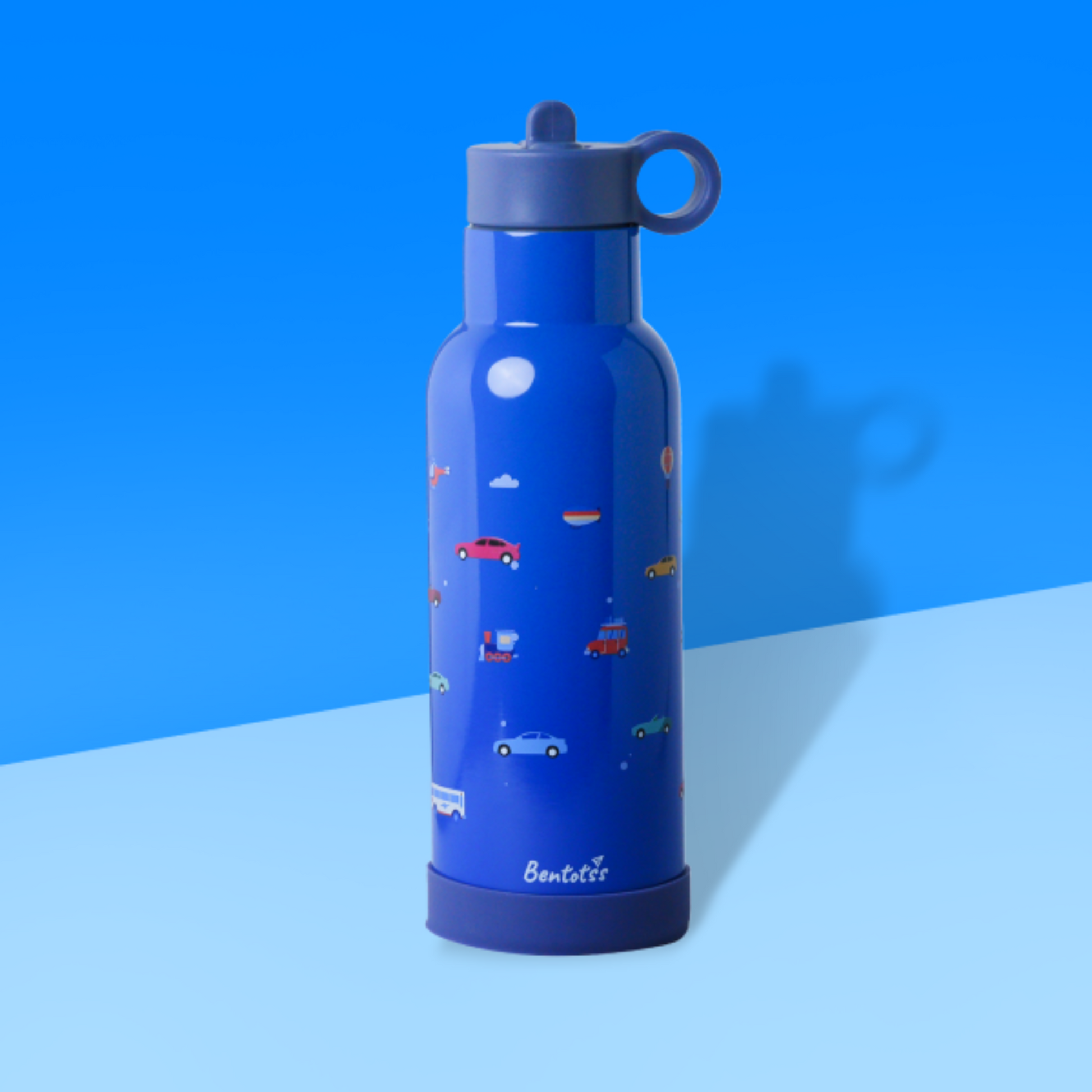 Bentotss Speedy Ride Blue Stainless Steel Bento Sipper bottle with a vehicle pattern, displayed against a blue and white background