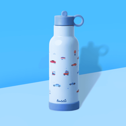 Bentotss Travel Trot Light Blue Stainless Steel Bento Sipper bottle with a small vehicle pattern, displayed against a bright blue and light blue background