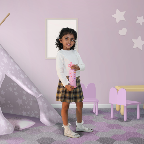 Girl holding Butterfly Magic Pink Bento Sipper – cute and durable water bottle for school