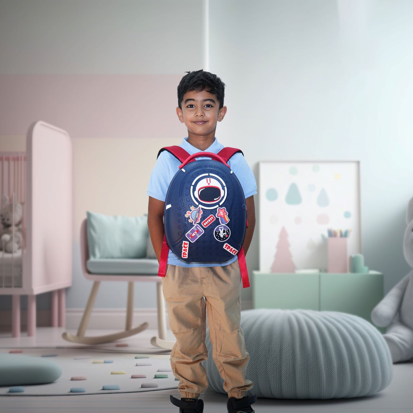 Boy carrying Cosmic Carry Blue Bento Bag space themed school backpack for boy