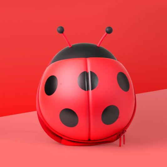 Bentotss Bugs & Bites Red Silicon Bento Bag featuring a 3D ladybug design with black spots, displayed on a red and pink background