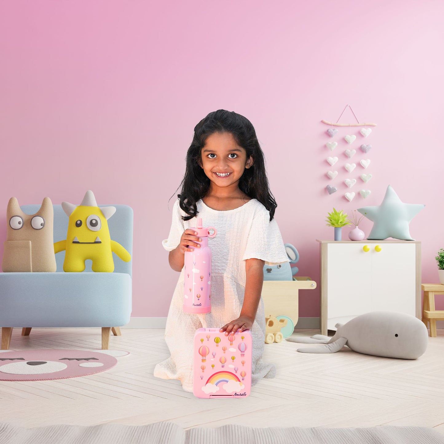 Girl holding Cloud Journey Pink Bento Box cute lunchbox for school and travel