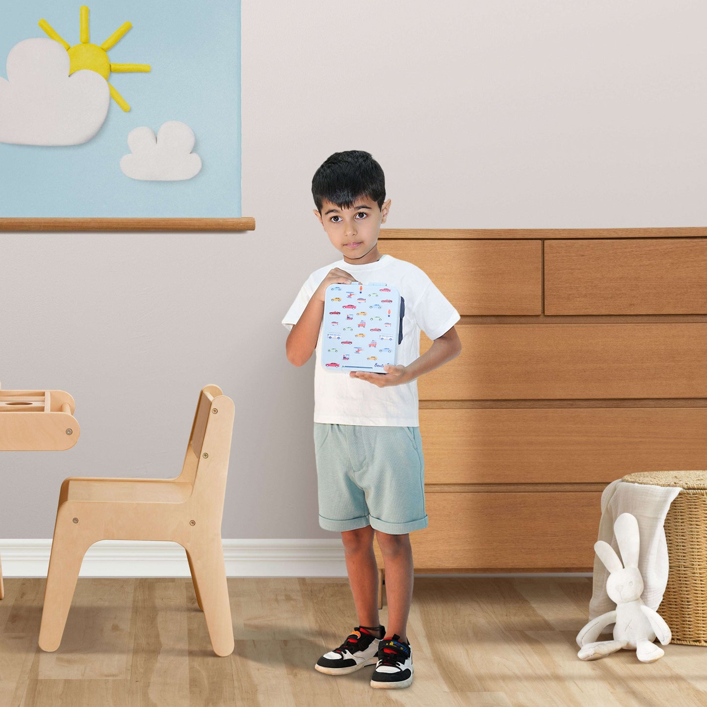 Boy holding Bentotss Travel Trot lunch box
