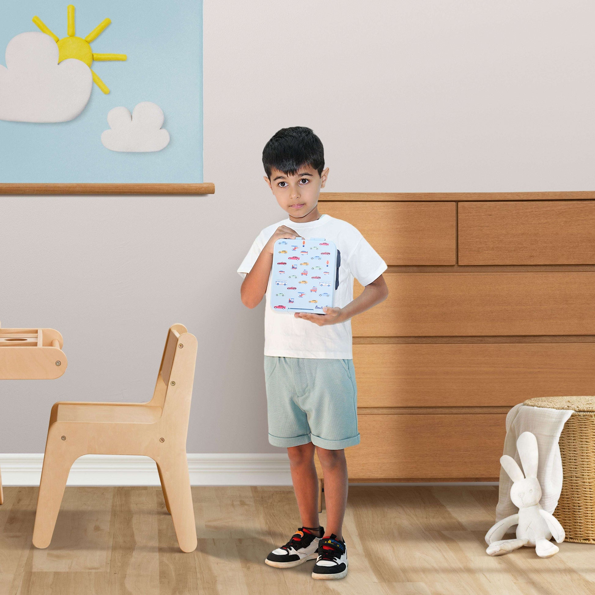 Boy holding Bentotss Travel Trot lunch box