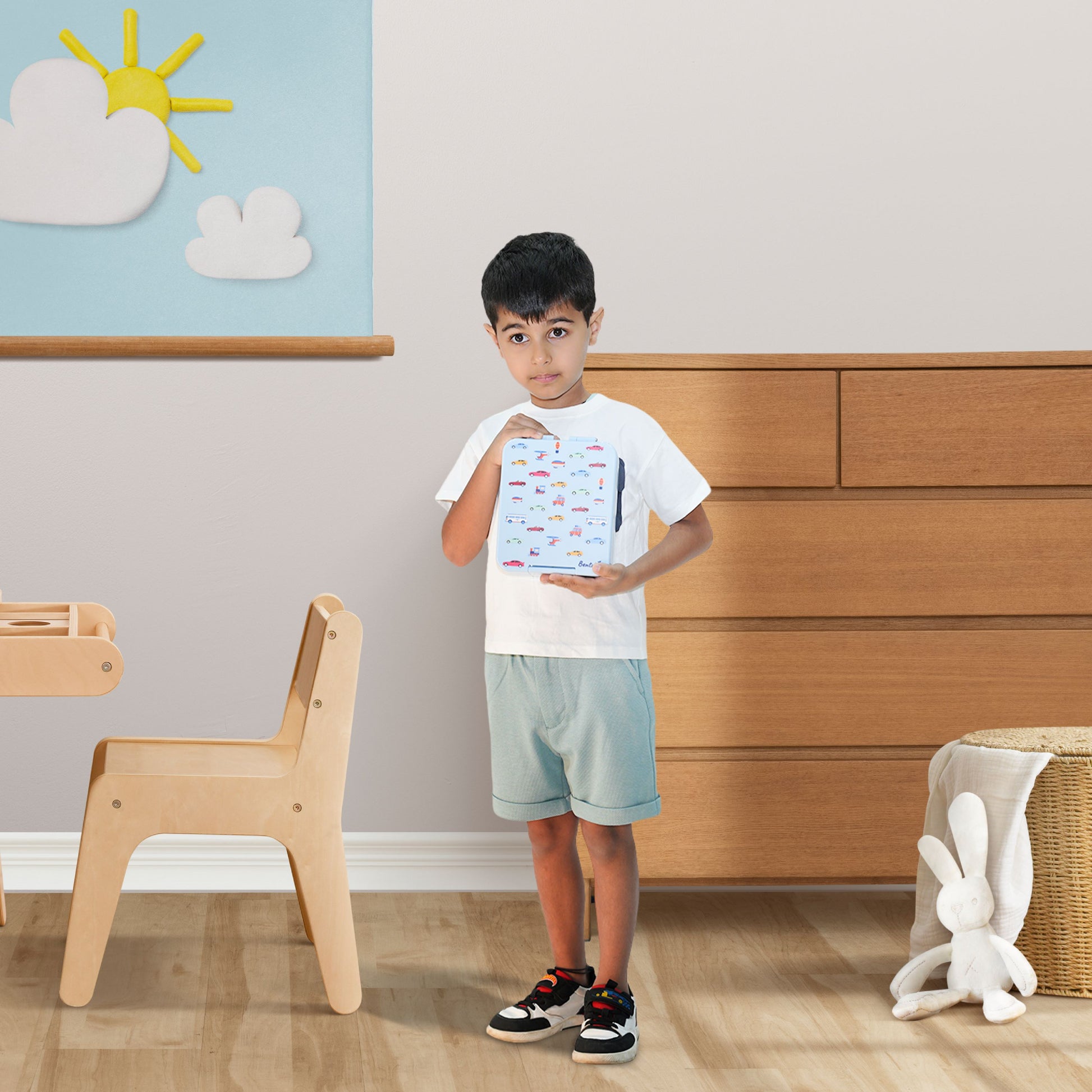 Boy holding Travel Trot Light Blue Bento Box